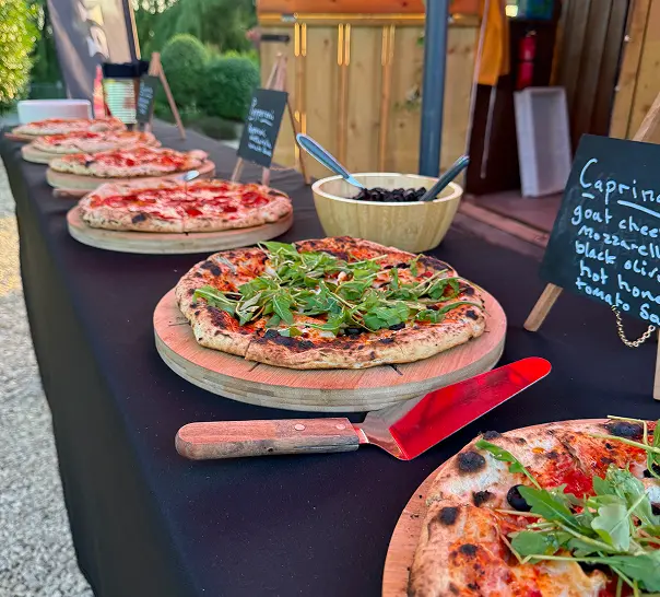 Freshly prepared pizzas ready to serve