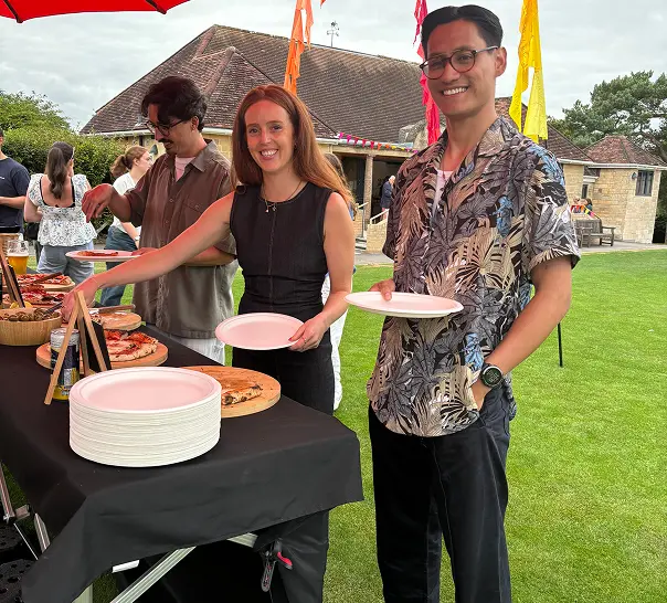Guests enjoying the wedding pizza buffet