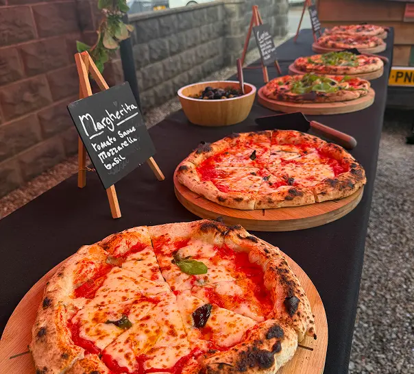 Margherita pizzas ready for wedding guests