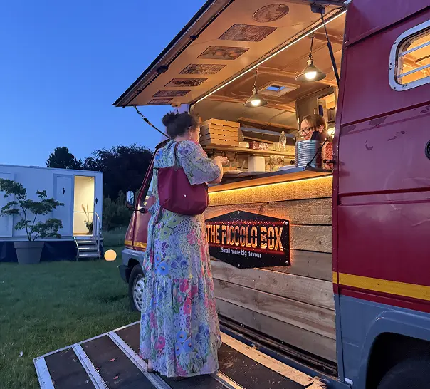 Wedding Guest Ordering Fresh Stone-Baked Pizza from The Piccolo Box Mobile Catering